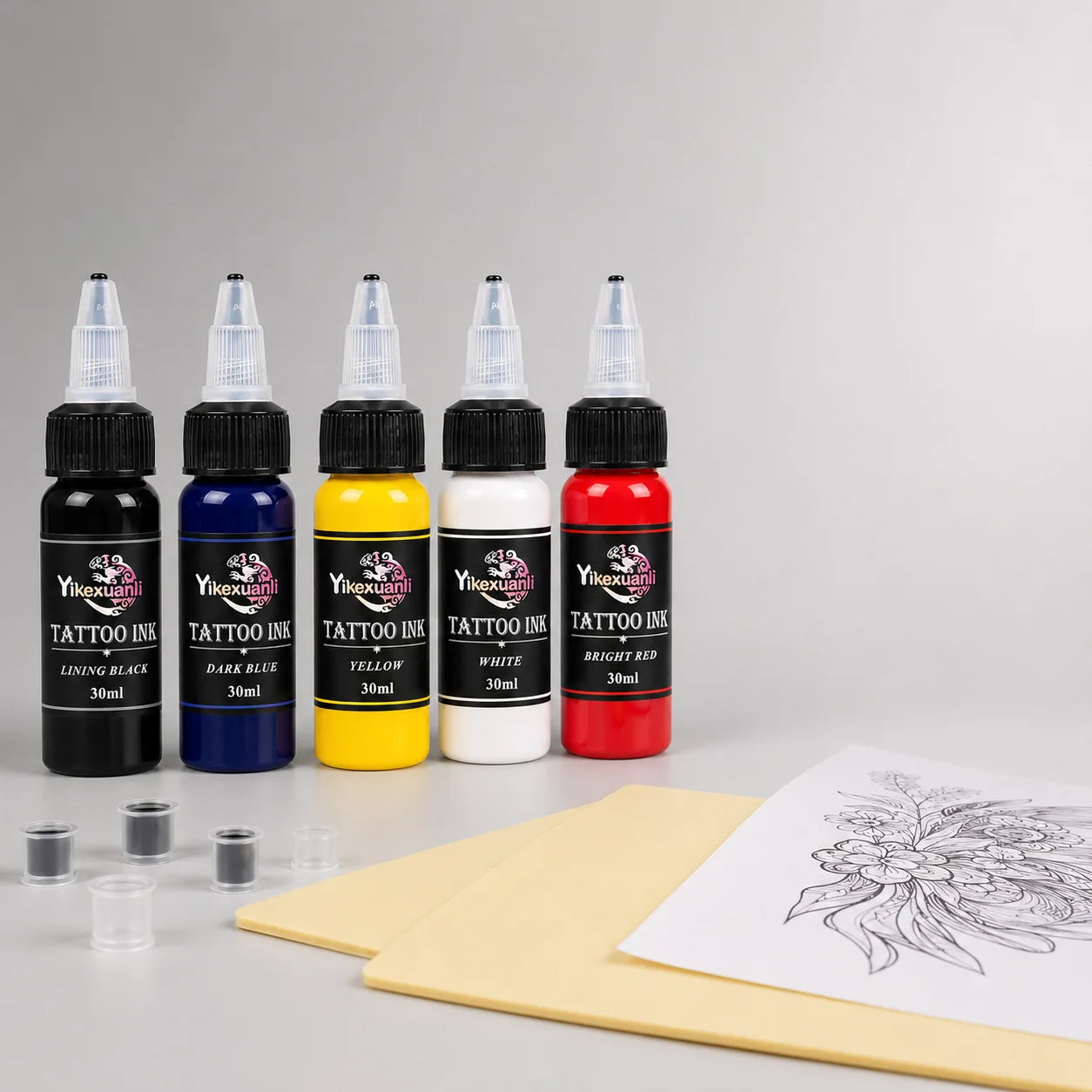 Yikexuanli 30ml tattoo ink 5 color set with lining black, royal blue, bright yellow, snow white, and bright red for tattoo color work and practice.
